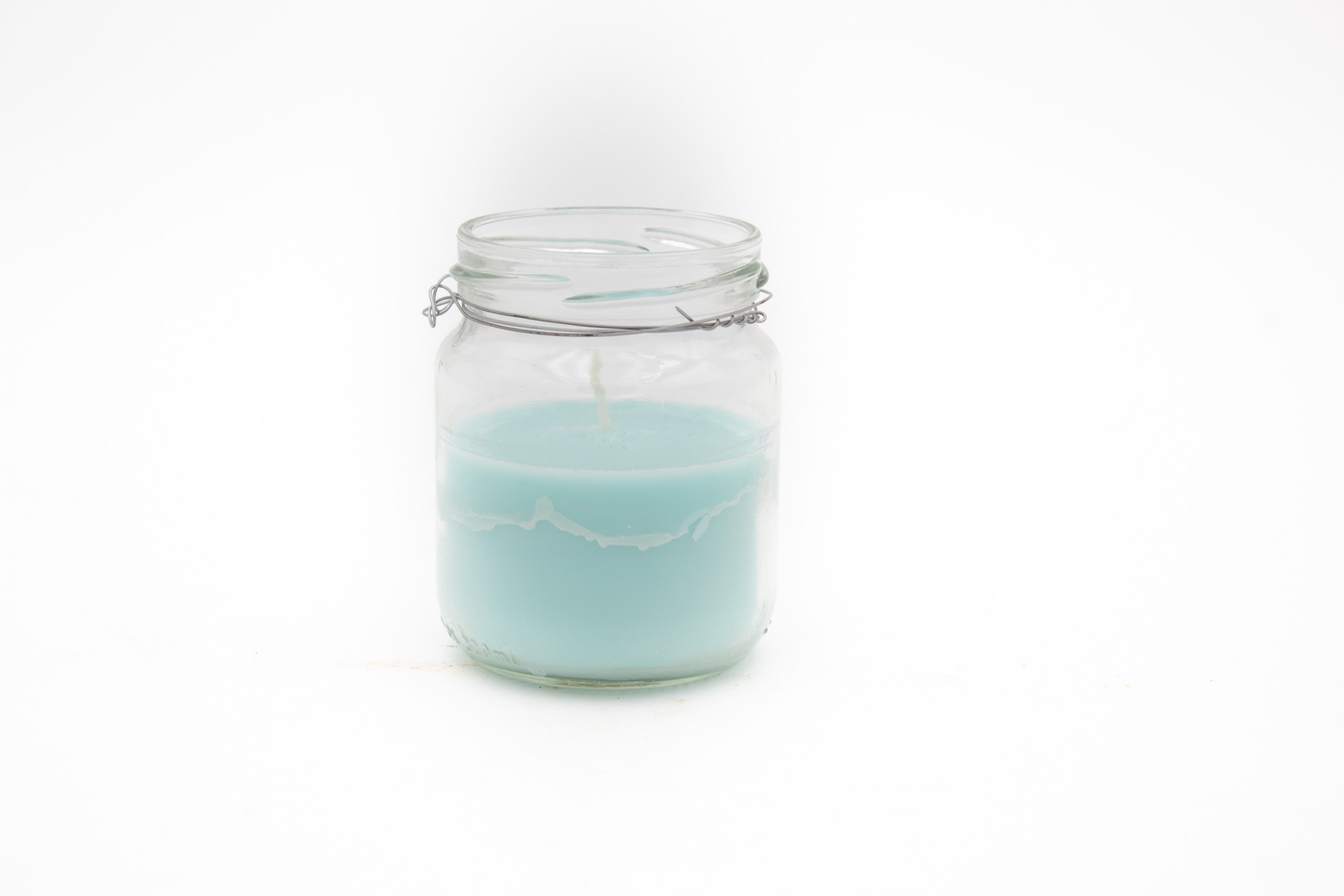 Kerze im Glas zum Hängen, mint, Brenndauer ca. 20 Stunden Kerze im Glas zum Hängen, mint, Brenndauer ca. 20 Stunden